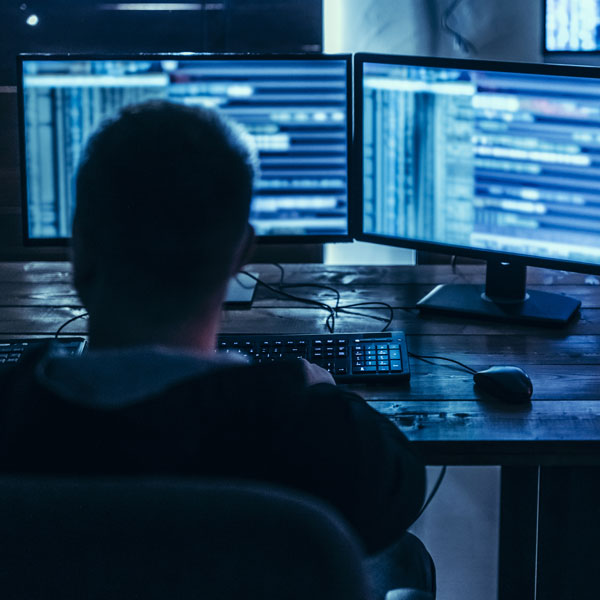 man on computer