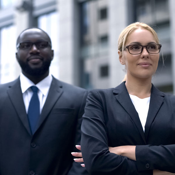 man and woman in suits